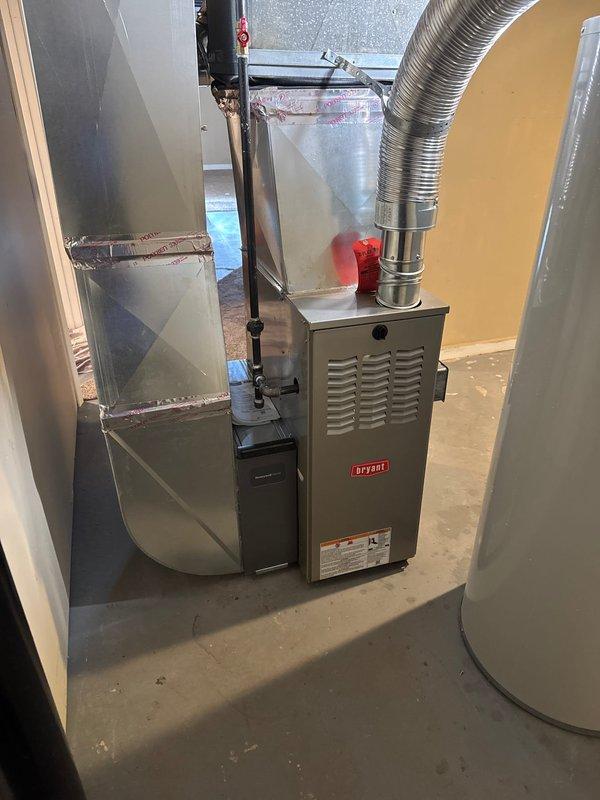 Successfully installed a Bryant 80% efficiency furnace in customer's basement, including proper connections to existing ductwork with sealed joints and appropriate gas line installation. Additionally, installed a humidifier system and ensured all components were properly functioning before completing the service.