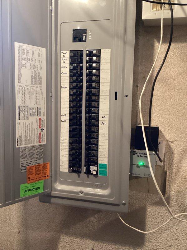 Completed installation of a 60-amp rated 240V circuit for an EV charging station in the garage, including a GFCI-protected 50-amp receptacle surface-mounted on the back wall near existing fixtures. Circuit runs with copper conductors from the main service panel, and all work was completed with proper permitting and passed inspection as evidenced by approval sticker. Additionally installed two customer-supplied Z-wave switches for patio heater and diagnosed power loss to basement receptacle.