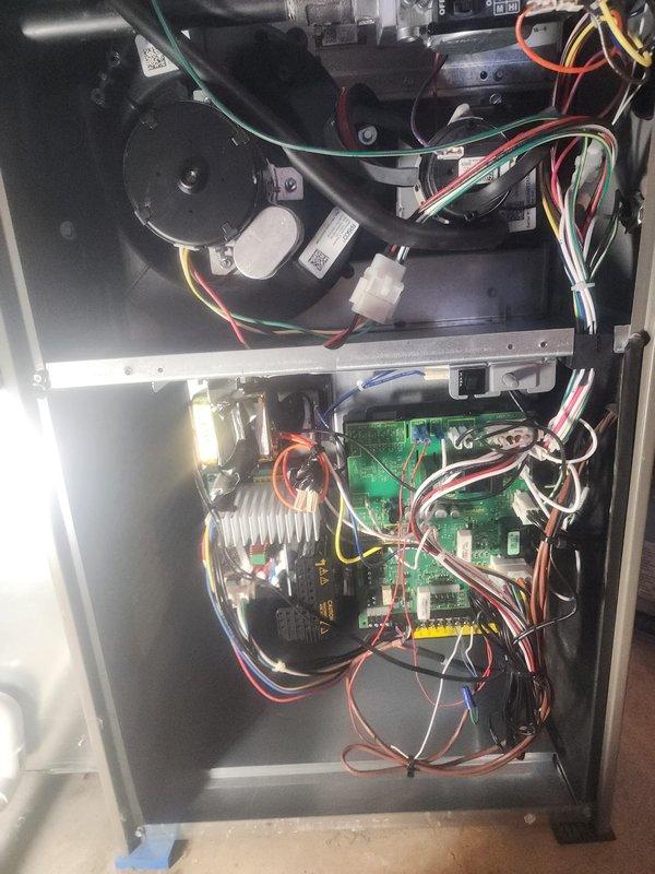 Performed scheduled prepaid maintenance on Lennox furnace system. Inspected internal control board components including circuit board connections, wiring integrity, and fan motor assembly. Examined ventilation system including PVC exhaust pipes and connections, ensuring proper installation and function of the complete heating system.