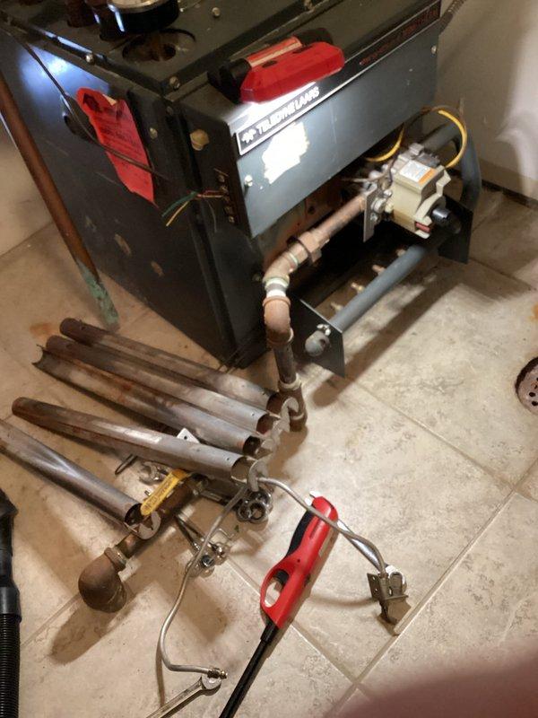 Completed scheduled boiler maintenance service on residential heating system. Inspected aging black boiler unit, associated copper piping, circulation pump, and control components for proper operation. Performed standard preventative maintenance procedures on the heating system to ensure optimal performance for the upcoming season.