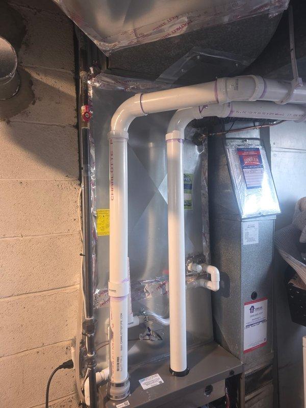 Responded to callback regarding slow heating after recent furnace installation. Inspected the complete system including PVC ventilation piping, drain connections, and all major components. Verified that the new unit is operating properly but explained to customer that an 8-hour timeframe to raise temperature by 4 degrees is reasonable performance given the home's thermal characteristics, especially during cold weather conditions.