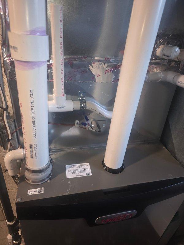 Responded to callback regarding slow heating after recent furnace installation. Inspected the complete system including PVC ventilation piping, drain connections, and all major components. Verified that the new unit is operating properly but explained to customer that an 8-hour timeframe to raise temperature by 4 degrees is reasonable performance given the home's thermal characteristics, especially during cold weather conditions.