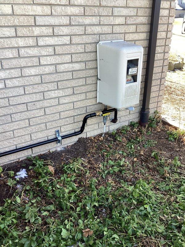 Completed installation of Briggs & Stratton 18kW generator and 150-amp transfer switch on residential property. Mounted transfer switch on exterior wall adjacent to utility meter, configured for whole-house backup capability. Customer was advised to contact gas utility for required meter upgrade to support generator fuel requirements.
