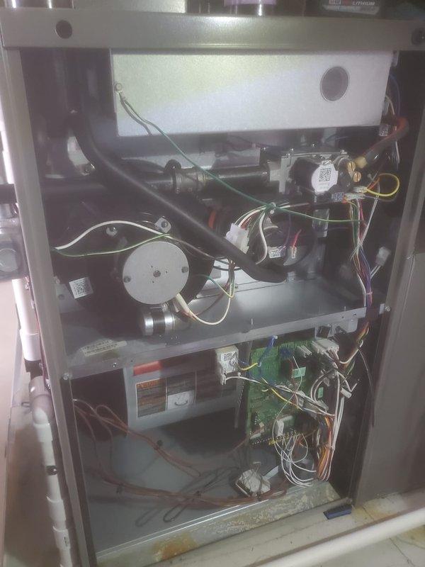 Completed routine maintenance on Lennox furnace under Worry Free Service Agreement. Inspected interior components including blower assembly, circuit boards, and electrical connections. Unit appears to be functioning properly with minor discoloration noted at base; all systems verified operational per manufacturer specifications.