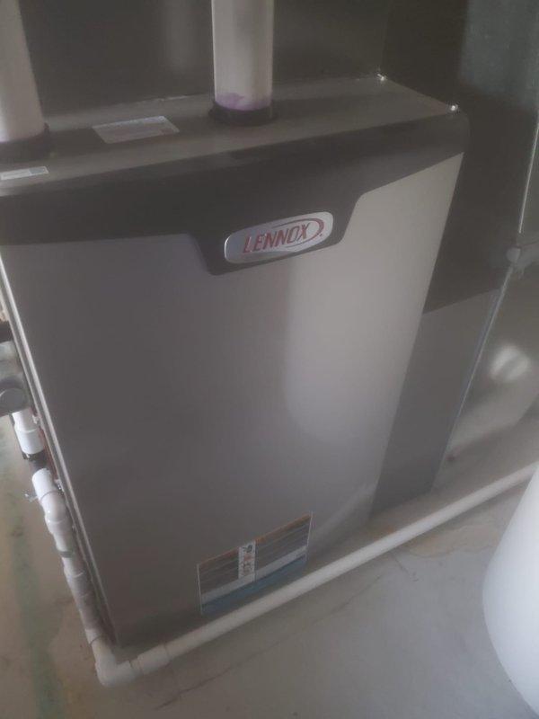 Completed routine maintenance on Lennox furnace under Worry Free Service Agreement. Inspected interior components including blower assembly, circuit boards, and electrical connections. Unit appears to be functioning properly with minor discoloration noted at base; all systems verified operational per manufacturer specifications.