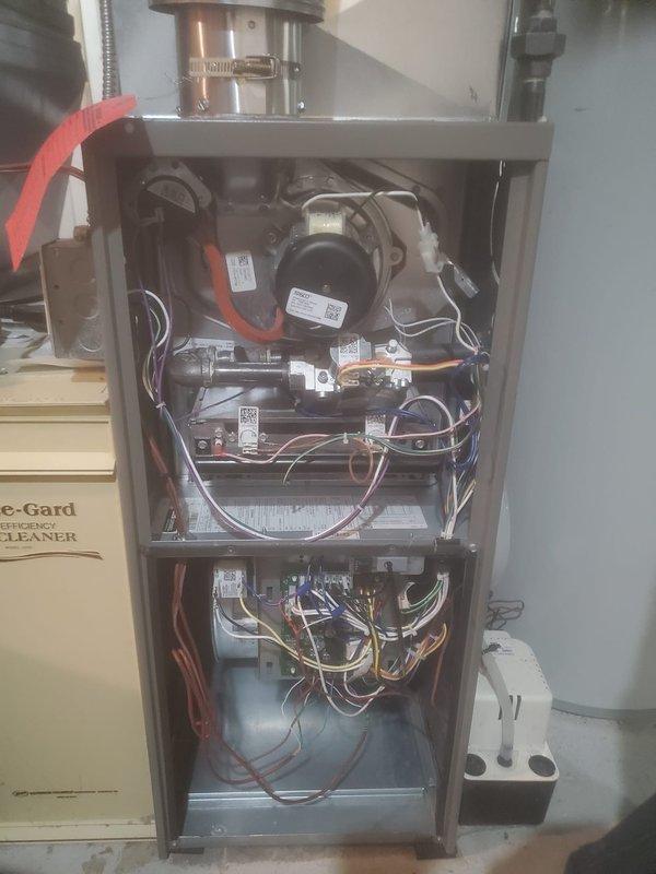 Completed annual furnace maintenance on Lennox gas heating system. Inspected internal components including blower motor, gas valve assembly, control board, and associated wiring connections. System includes a Space-Gard Air Cleaner unit. All components were found to be in working condition.
