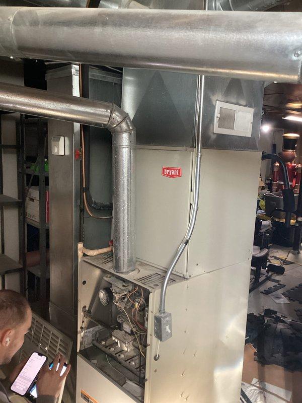 Conducted inspection and prepared estimate for replacement of existing Bryant furnace system. Documented current installation configuration including main unit, ductwork connections, and surrounding mechanical space. Evaluation focused on equipment condition, ductwork integrity, and potential upgrade requirements for improved system efficiency.