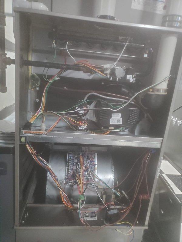 Performed scheduled maintenance on Bryant furnace system per FRN maintenance agreement. Accessed and inspected internal components including blower assembly, circuit boards, and wiring harnesses to verify proper connections and operation. Examined PVC venting system and confirmed proper installation of exhaust/intake piping with no visible issues detected.