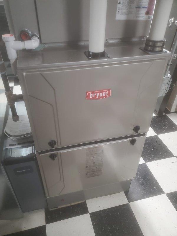 Performed scheduled maintenance on Bryant furnace system per FRN maintenance agreement. Accessed and inspected internal components including blower assembly, circuit boards, and wiring harnesses to verify proper connections and operation. Examined PVC venting system and confirmed proper installation of exhaust/intake piping with no visible issues detected.