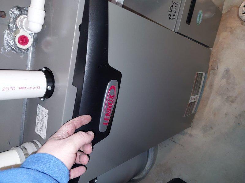 Performed comprehensive heating maintenance on a one-year-old Lennox EL297UHV furnace located in basement. Conducted full system inspection and tune-up according to Worry Free Service Agreement specifications, confirming proper installation of all components including PVC venting and connections. System is functioning correctly with no issues identified; documented condition with photos showing equipment in good working order.