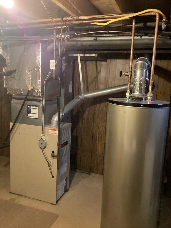 Conducted comprehensive evaluation of 20+ year old HVAC system in residential property, documenting obsolete furnace in basement and aging central air unit in backyard. Provided replacement estimate for complete system upgrade, noting current equipment has exceeded typical service lifespan and replacement would improve energy efficiency and reliability.