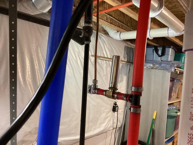 Successfully installed a new 50-gallon water heater in the residential mechanical room, complete with proper PVC connections. System was integrated with existing HVAC and water treatment equipment, ensuring all plumbing connections (including red supply, blue return pipes) were properly sealed and pressure tested.