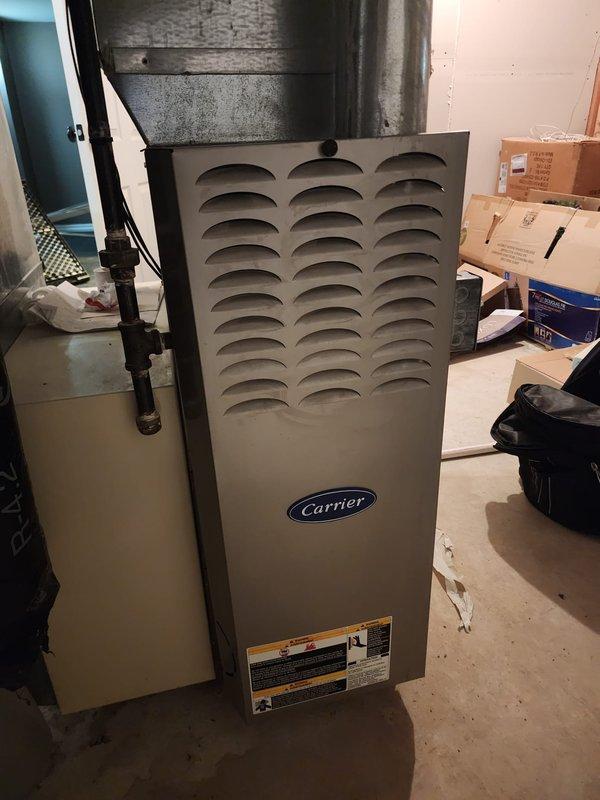 Performed annual heating maintenance on Carrier furnace under Worry Free Service Agreement. Inspected system components, identifying significant corrosion on exhaust piping that requires attention. Completed all standard tune-up procedures and documented condition with photos for service records.