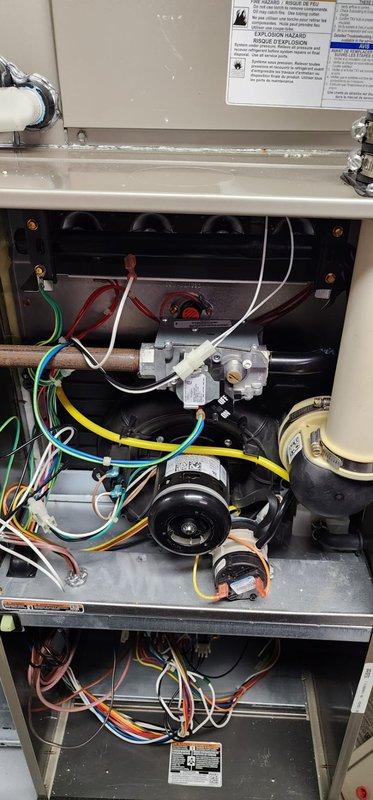 Performed comprehensive heating system tune-up on aging furnace located in basement utility room. Inspected internal components including gas valve assembly, motor, electrical connections, and wiring harnesses; all components found to be in proper working order. System was returned to service with no issues identified; customer maintenance agreement remains valid through 2025.