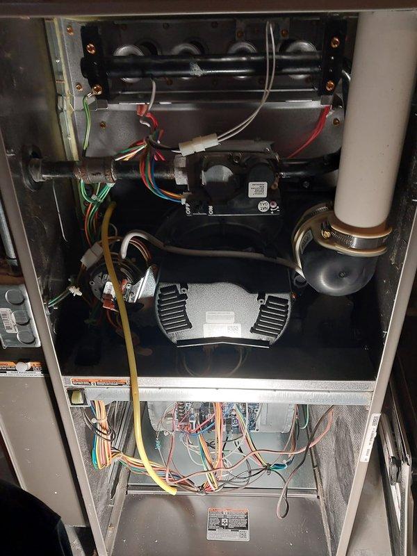 Performed comprehensive furnace maintenance under Worry Free Service Agreement. Inspected heat exchanger assembly, blower motor, and electrical connections, confirming all components are properly mounted and functioning normally. Verified proper installation of PVC venting system and confirmed control board operation with no abnormal conditions observed.