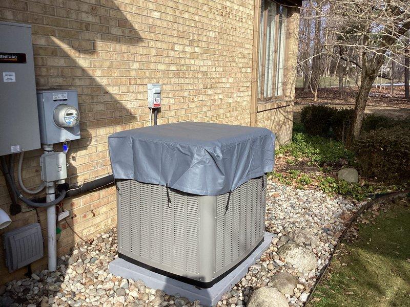 Installed protective cover on outdoor condenser unit as requested. Unit is properly mounted on concrete pad with appropriate electrical connections to disconnect box. Documented installation with photos showing completed work.