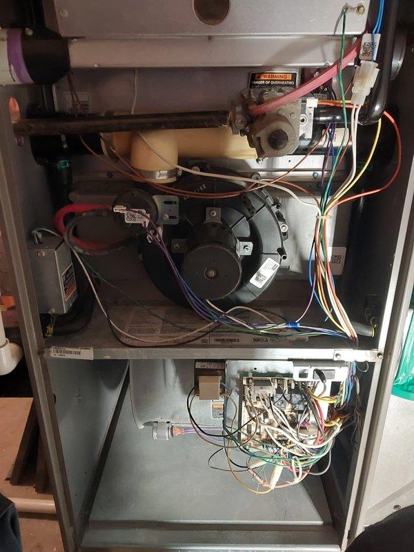 Performed scheduled heating maintenance on Lennox furnace under Worry Free Service Agreement. Conducted comprehensive inspection of heat exchanger, blower assembly, draft inducer motor, gas valve components, and control board with all electrical connections. System is operating properly with no issues detected; all components are intact with proper wiring connections maintained.