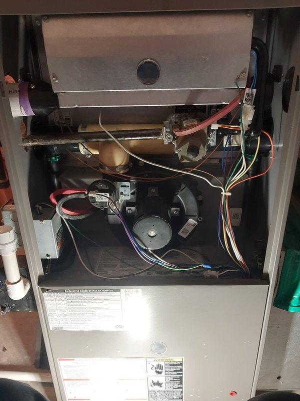 Performed scheduled heating maintenance on Lennox furnace under Worry Free Service Agreement. Conducted comprehensive inspection of heat exchanger, blower assembly, draft inducer motor, gas valve components, and control board with all electrical connections. System is operating properly with no issues detected; all components are intact with proper wiring connections maintained.