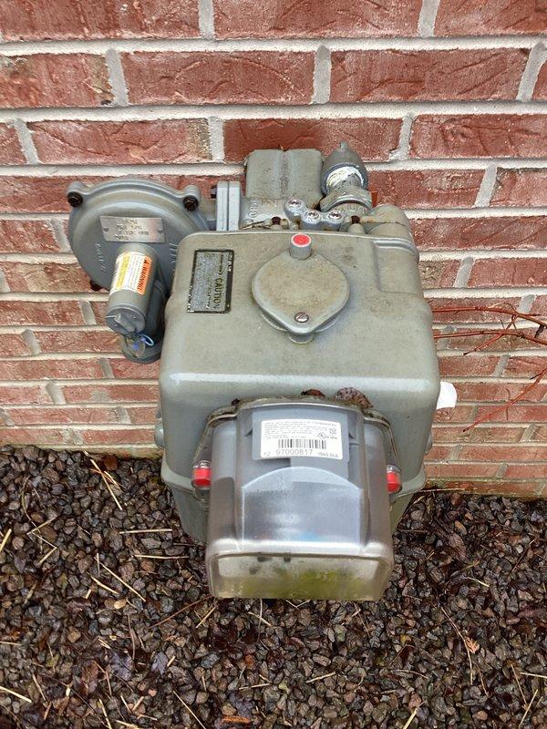 Conducted site assessment for generator installation and potential garage unit heater. Documented existing electrical infrastructure including main meter setup, junction boxes, and conduit configuration. Also inspected gas regulator system to evaluate compatibility with proposed generator installation.