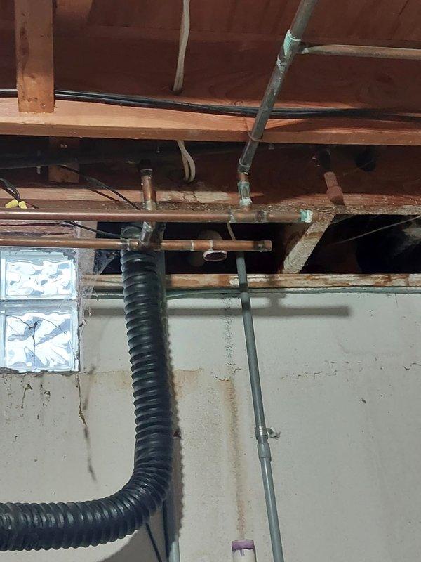 Performed scheduled maintenance on two HVAC systems under Worry Free Service Agreement. Inspected furnace/air handler with PVC ventilation components and confirmed proper installation of ductwork and piping throughout the utility area. All systems functioning within normal parameters; no issues requiring immediate attention were identified.