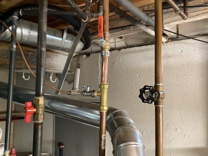 Completed follow-up inspection on failed furnace installation. Replaced entire furnace exhaust system with Schedule 40 PVC (ASTM 2665) and installed hammer arrester to water supply line. Verified proper combustion with blue flame pattern indicating normal operation.