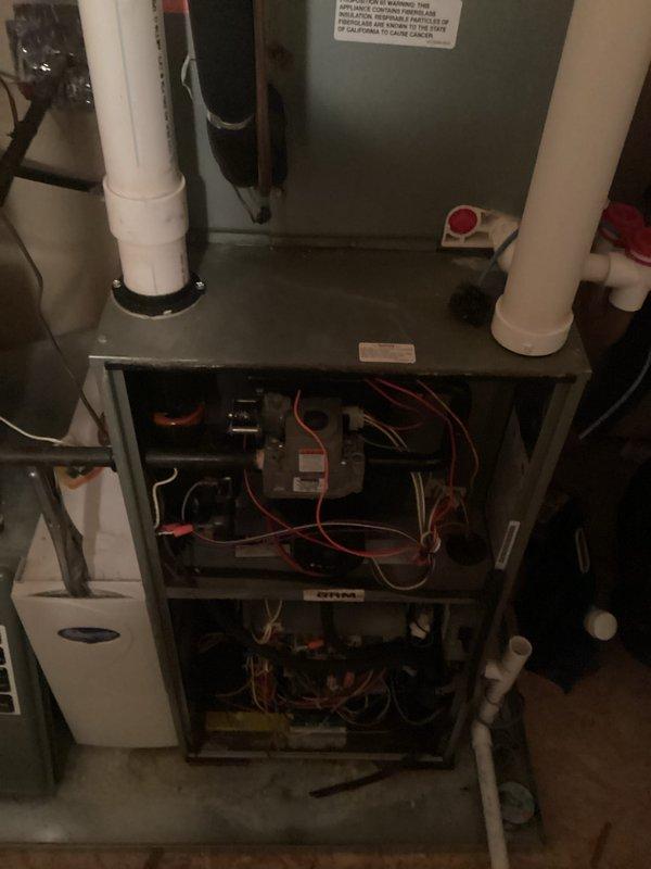 Performed comprehensive assessment of existing furnace system, documenting current installation configuration and internal component condition. Inspection revealed aging system with exposed electrical components and connections requiring replacement. Prepared multiple replacement options (quotes 03826-02, 03826-04, 03826-05) for customer consideration, with installation timeframe estimated for 4-5pm.