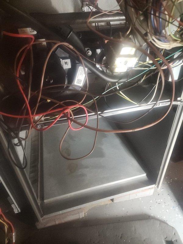 Performed annual maintenance service on Lennox furnace, which included inspection of control board and electrical connections. Removed access panel to examine interior components and verified proper wiring integrity. System is operating within normal parameters with no immediate concerns identified.