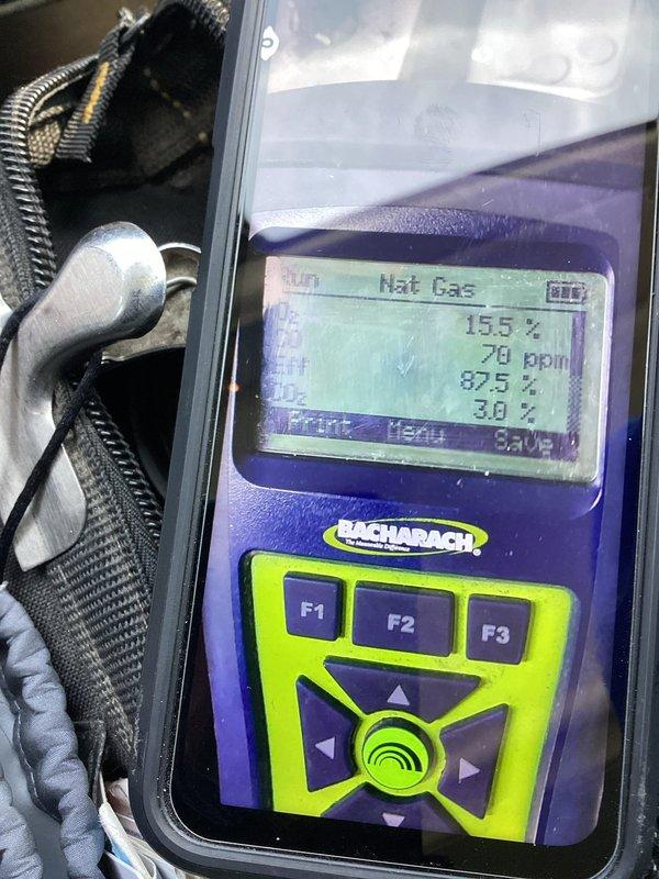 Performed CSD1 annual boiler inspection on Unit 112, including combustion analysis with Bacharach analyzer confirming proper natural gas readings (15.5% O2, 70 ppm CO, 87.5% efficiency, 3.0% CO2). Visual inspection revealed aging infrastructure with deteriorating wall conditions around the boiler installation and some surface rust on copper components; documented with photos for reference.