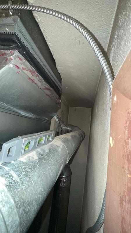 Completed callback service for failed inspection correction. Adjusted vent connectors to achieve proper 1/4" pitch per foot upward toward chimney as required by code. Documented the corrected installation with photographs and forwarded them to the inspector as requested.