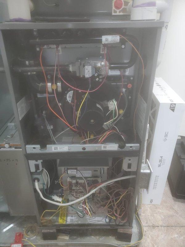 Performed scheduled furnace maintenance on Ruud unit, including inspection of interior components, wiring connections, and control boards. Examined blower motor assembly and electrical system for proper operation. All systems found to be functioning normally with no issues identified.