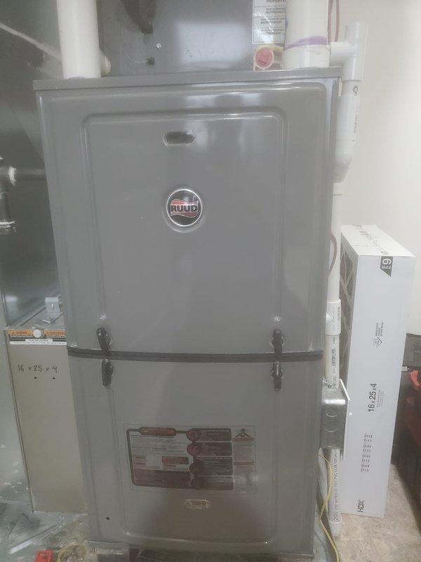 Performed scheduled furnace maintenance on Ruud unit, including inspection of interior components, wiring connections, and control boards. Examined blower motor assembly and electrical system for proper operation. All systems found to be functioning normally with no issues identified.