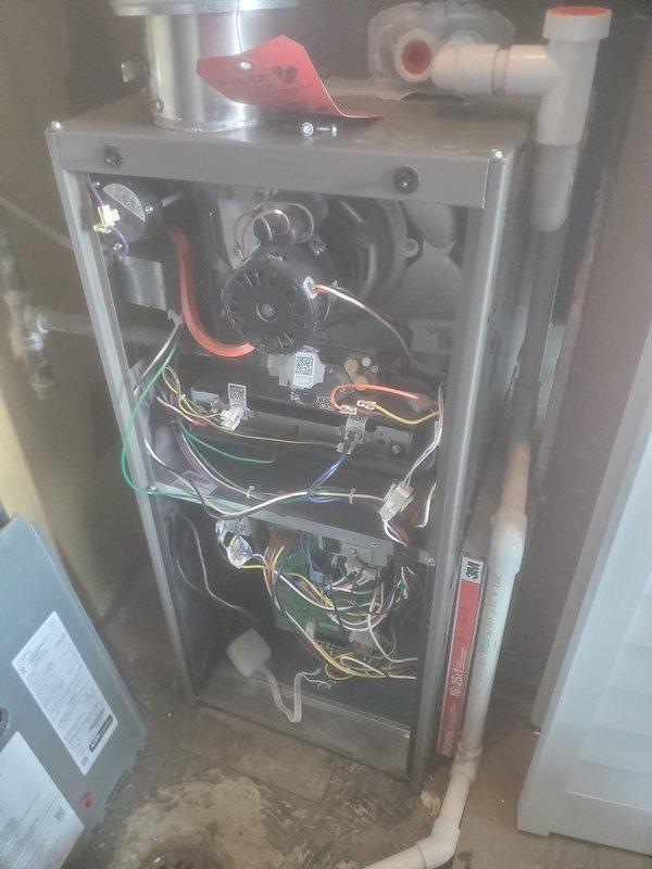 Performed scheduled maintenance on Lennox furnace under FRN maintenance agreement. Removed access panels to inspect and clean internal components including blower wheel, circuit boards, and electrical connections. Verified proper operation of exhaust/intake system and condensate drainage; attached service tag upon completion.