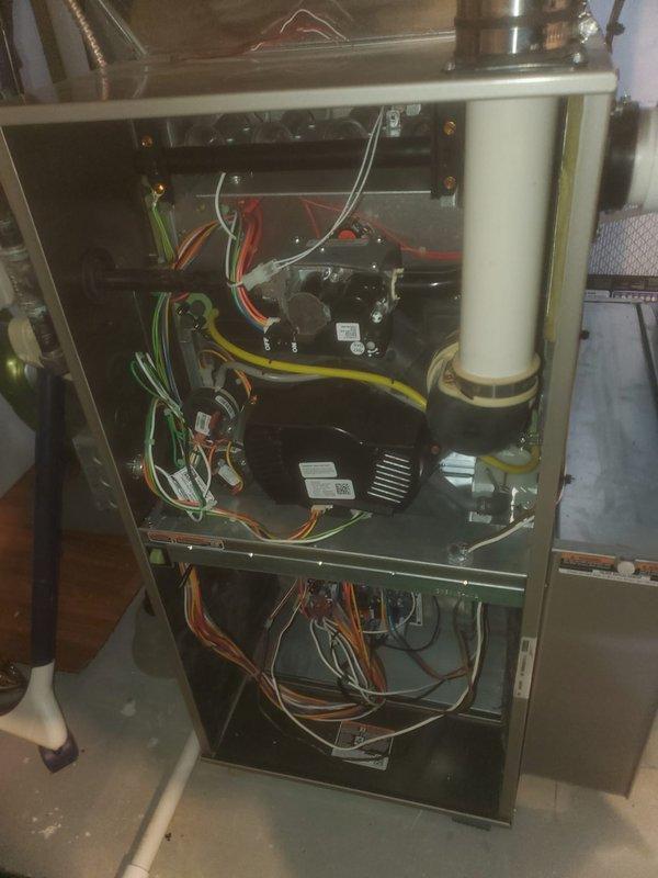 Performed scheduled maintenance on two HVAC systems under Worry Free Service Agreement. Inspected both furnace units, checking electrical connections, blower assemblies, and control boards. All components were found in normal working condition with proper wiring integrity and ventilation systems functioning as designed.