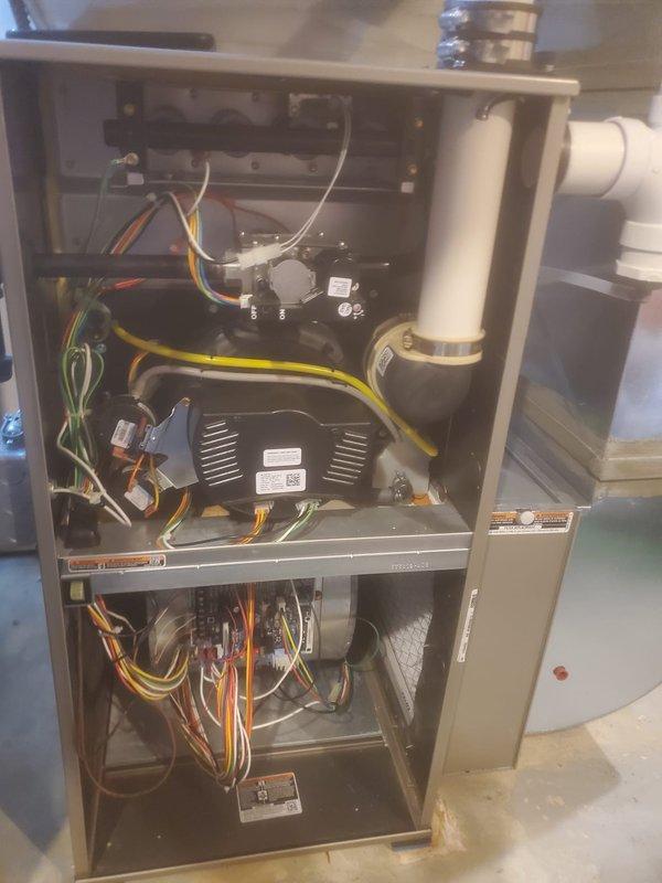 Performed scheduled maintenance on two HVAC systems under Worry Free Service Agreement. Inspected both furnace units, checking electrical connections, blower assemblies, and control boards. All components were found in normal working condition with proper wiring integrity and ventilation systems functioning as designed.