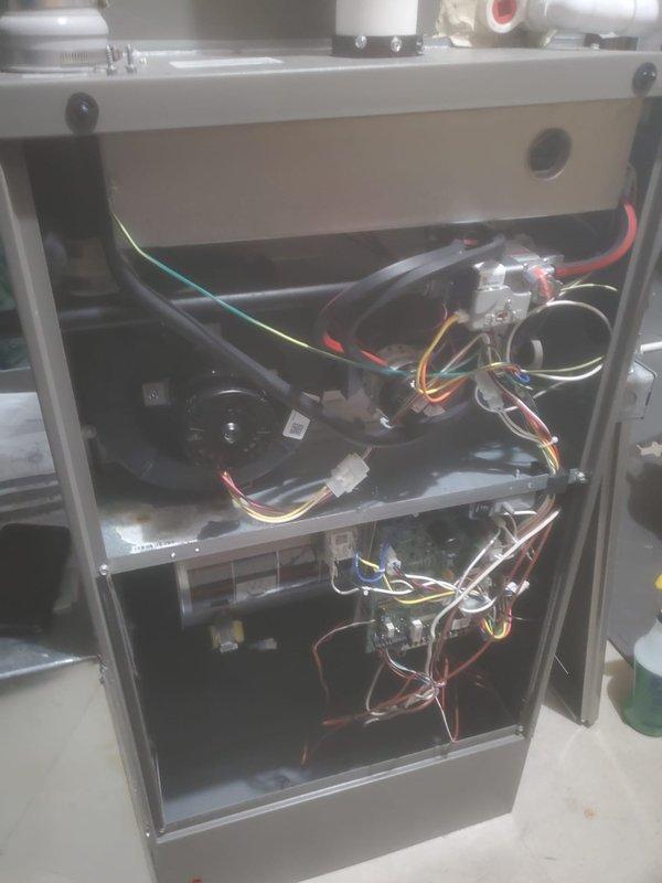 Performed scheduled maintenance on Lennox furnace system. Completed inspection of internal electrical components and wiring connections, ensuring proper operation of motor assembly and control boards. Documented condition of ventilation system including PVC exhaust piping, confirming unit is operating within manufacturer specifications.