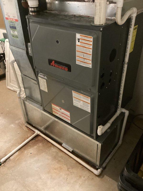 Provided inspection and estimate for replacement of aging HVAC systems, including an 8-year-old furnace and 18-year-old A/C unit. Recommended upgrade to a 2-stage 120MBH furnace and variable speed 4-ton A/C condenser to replace current equipment that is operational but approaching end of useful life. Observed PVC pipe deterioration with significant discoloration and degradation at connection points requiring attention during system replacement.