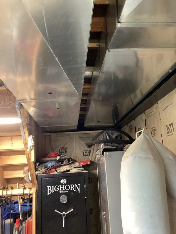 Conducted a comprehensive generator installation assessment in residential basement. Evaluated existing utility area with exposed HVAC ductwork, electrical systems, and available space constraints for optimal generator placement. Documented site conditions including ceiling joists, concrete flooring, and proximity to existing mechanical systems to determine appropriate generator specifications and installation requirements.