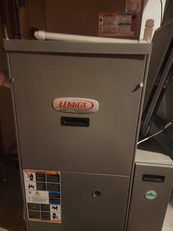 Performed comprehensive furnace maintenance on Lennox heating system per promotional rebate program. Inspected and verified proper wiring connections at control board, ensuring all colored wires (yellow, red, green, blue, orange, white, and brown) were securely fastened and in good condition. System operations tested normal with proper exhaust venting through PVC flue pipe.