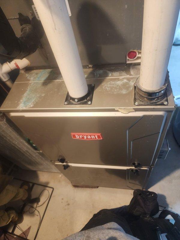 Performed scheduled furnace maintenance under Worry Free Service Agreement on Bryant HVAC system. Inspected interior components including blower assembly, gas valve, control board, and wiring connections. System is functioning properly with no issues identified; unit was left in normal operating condition.