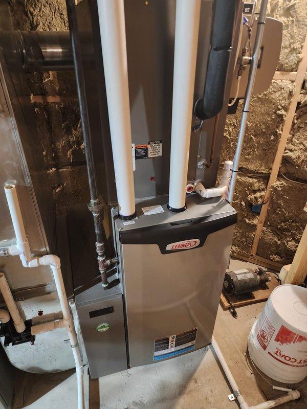 Performed routine maintenance on a Lennox furnace located in the basement. Inspected and cleaned all components, verified proper operation of the exhaust/intake PVC piping system, and confirmed the condensate pump was functioning correctly. Reminded customer to change filter monthly as recommended.