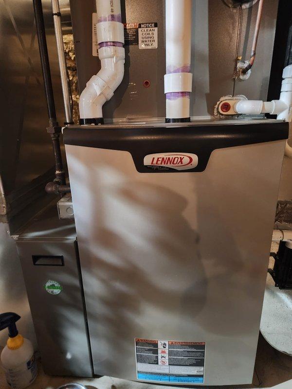 Performed routine maintenance on a Lennox furnace located in the basement. Inspected and cleaned all components, verified proper operation of the exhaust/intake PVC piping system, and confirmed the condensate pump was functioning correctly. Reminded customer to change filter monthly as recommended.