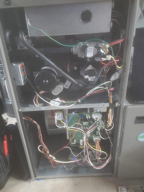 Performed scheduled maintenance on Lennox Elite furnace system. Inspected interior components including blower motor assembly, circuit board, and all electrical connections. Verified proper operation and condition of all system components with no issues found.
