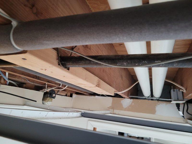 Successfully installed a new Bryant 80% efficiency furnace and air conditioning system, including complete electrical wiring for the A/C unit as specified in the take-off. Work involved accessing ceiling joists and utility areas to properly integrate the HVAC components with existing building infrastructure.