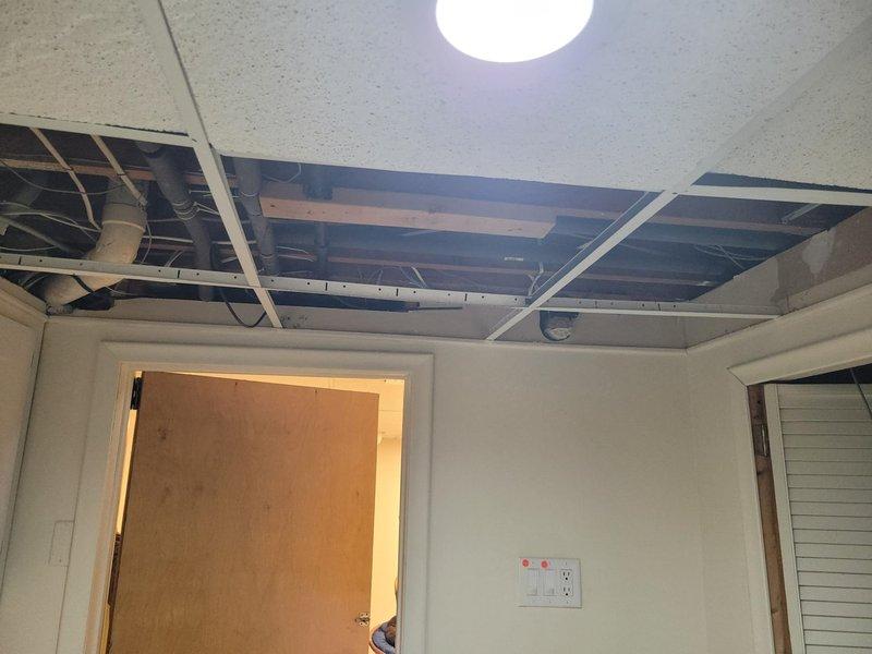 Successfully installed a new Bryant 80% efficiency furnace and air conditioning system, including complete electrical wiring for the A/C unit as specified in the take-off. Work involved accessing ceiling joists and utility areas to properly integrate the HVAC components with existing building infrastructure.