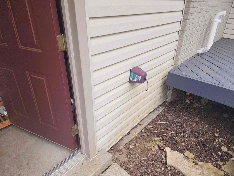 # Electrical Estimate - Generator Service Summary

Conducted on-site evaluation and documentation for generator transfer switch installation. Assessed existing electrical infrastructure and confirmed specifications for EST10-12pLVM transfer switch unit mounted on exterior wall near residential entry point. Photographed installation location, including interior access points and exterior mounting position of transfer switch equipment, to provide comprehensive visual documentation for project estimate and planning purposes.