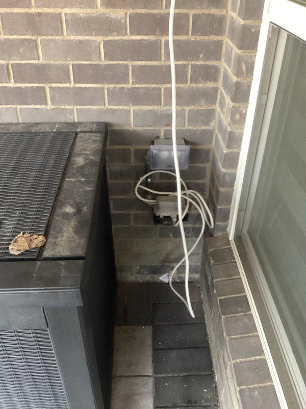 Installed UF cable on underside of deck to supply four new light locations and one new fan location, with power sourced from existing switched light fixture. Ran wiring up wall in protective conduit from tap point to deck underside. Additionally installed UF cable for new receptacle location to control shade screens, tapping power from existing outlet and routing through wall-mounted conduit for protection. All wiring terminated at designated locations for fixture and device installation by under-deck system contractor.