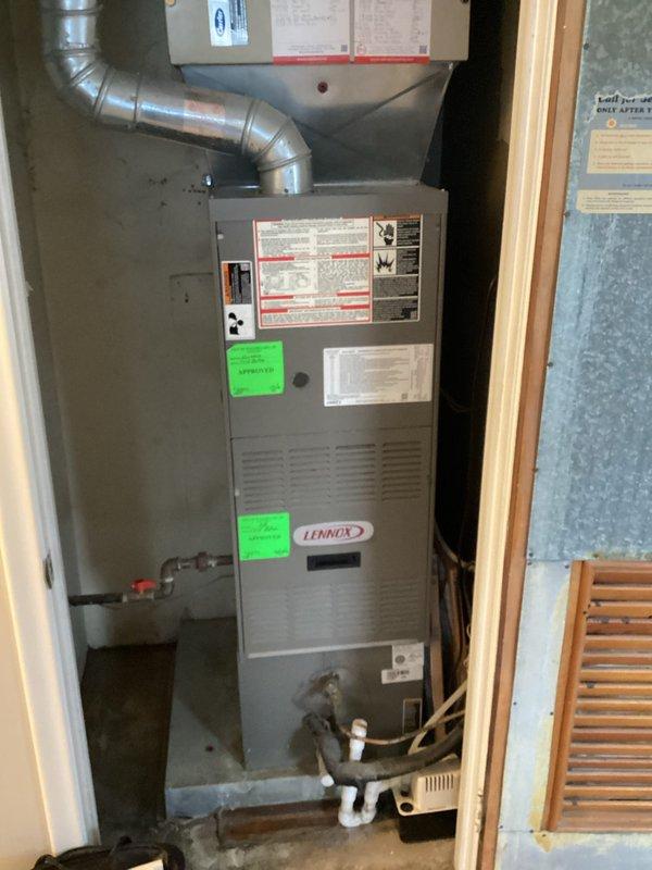 Conducted HVAC system evaluation for potential replacement on existing Lennox furnace installation. Assessed current equipment condition, documented unit specifications and model information, and photographed existing furnace setup including ductwork connections and PVC condensate drainage system. Reviewed electrical panel capacity and circuit availability to determine compatibility for new equipment installation. Discussed available rebate programs and replacement options with customer to provide comprehensive estimate for system upgrade.