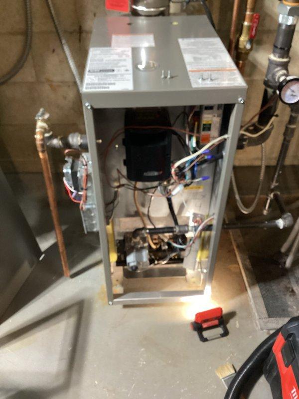 Performed comprehensive preventive maintenance on Lennox residential boiler system. Conducted thorough inspection of all internal components including blower motor, heat exchanger, control board, and electrical connections. Verified proper operation of hydronic piping system, checked pressure gauges, and inspected all brass valves and fittings for leaks or wear. Cleaned and tested burner assembly, examined copper tubing connections, and confirmed all safety controls functioning within manufacturer specifications. System tested and operating efficiently upon completion.