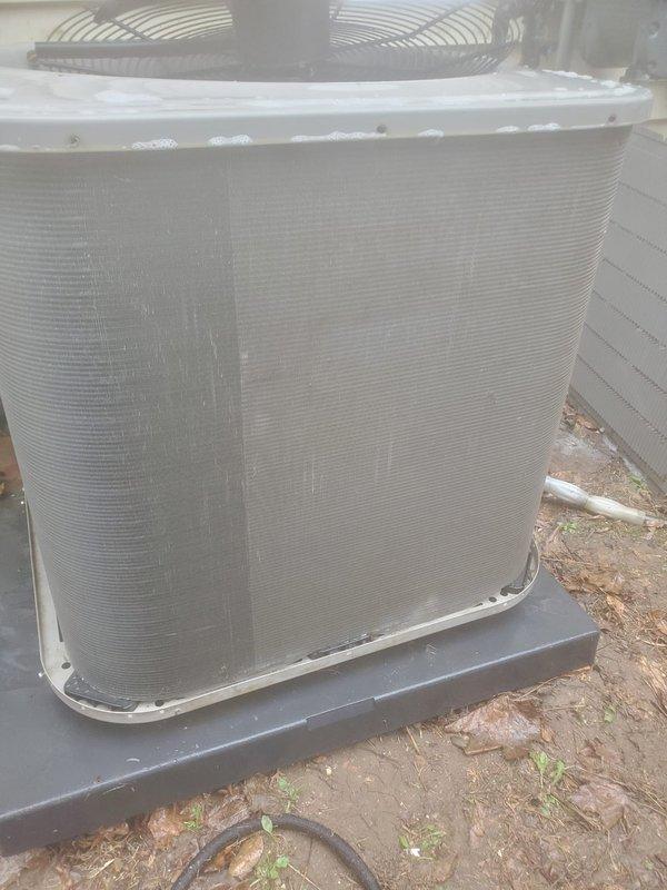 Completed routine cooling season maintenance on residential air conditioning system. Inspected outdoor condenser unit including compressor, refrigerant lines, condenser coils, and fan assembly; verified proper operation and checked condensate drain pan for adequate drainage. All components found operating within normal parameters with no immediate service needs identified.