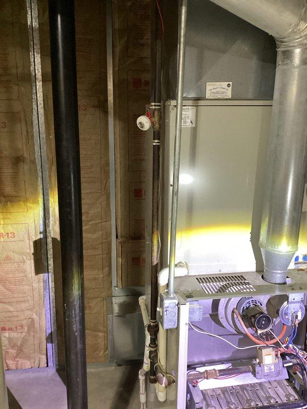 Conducted comprehensive in-home consultation for replacement of 25-year-old furnace and air conditioning system. Evaluated existing equipment including basement-located furnace with air handler and exterior condenser unit, documented current system configuration with detailed photographic assessment of ductwork connections, gas line installation, and blower assembly. Provided multiple replacement options through quotes 03894-01, 03894-03, and 03894-05, offering professional second opinion on repair versus replacement recommendations based on equipment age and condition.